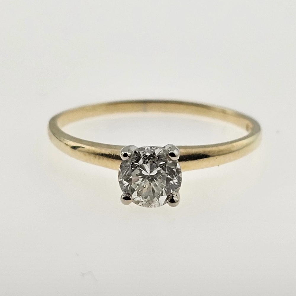 Vintage solitaire diamond ring 
14k yellow old European cut diamond